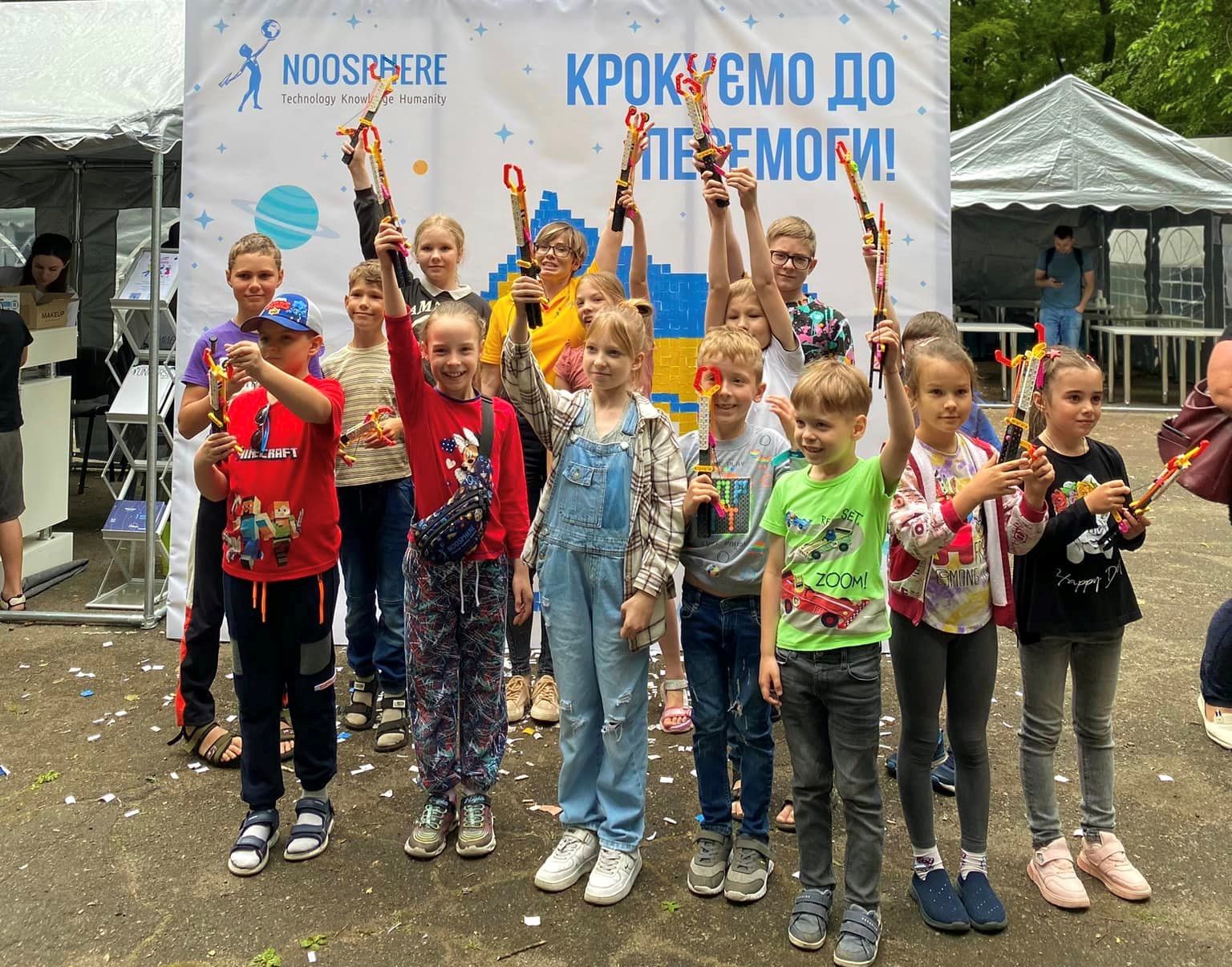 Children from Dnipro create a mosaic based on a mural by French artist